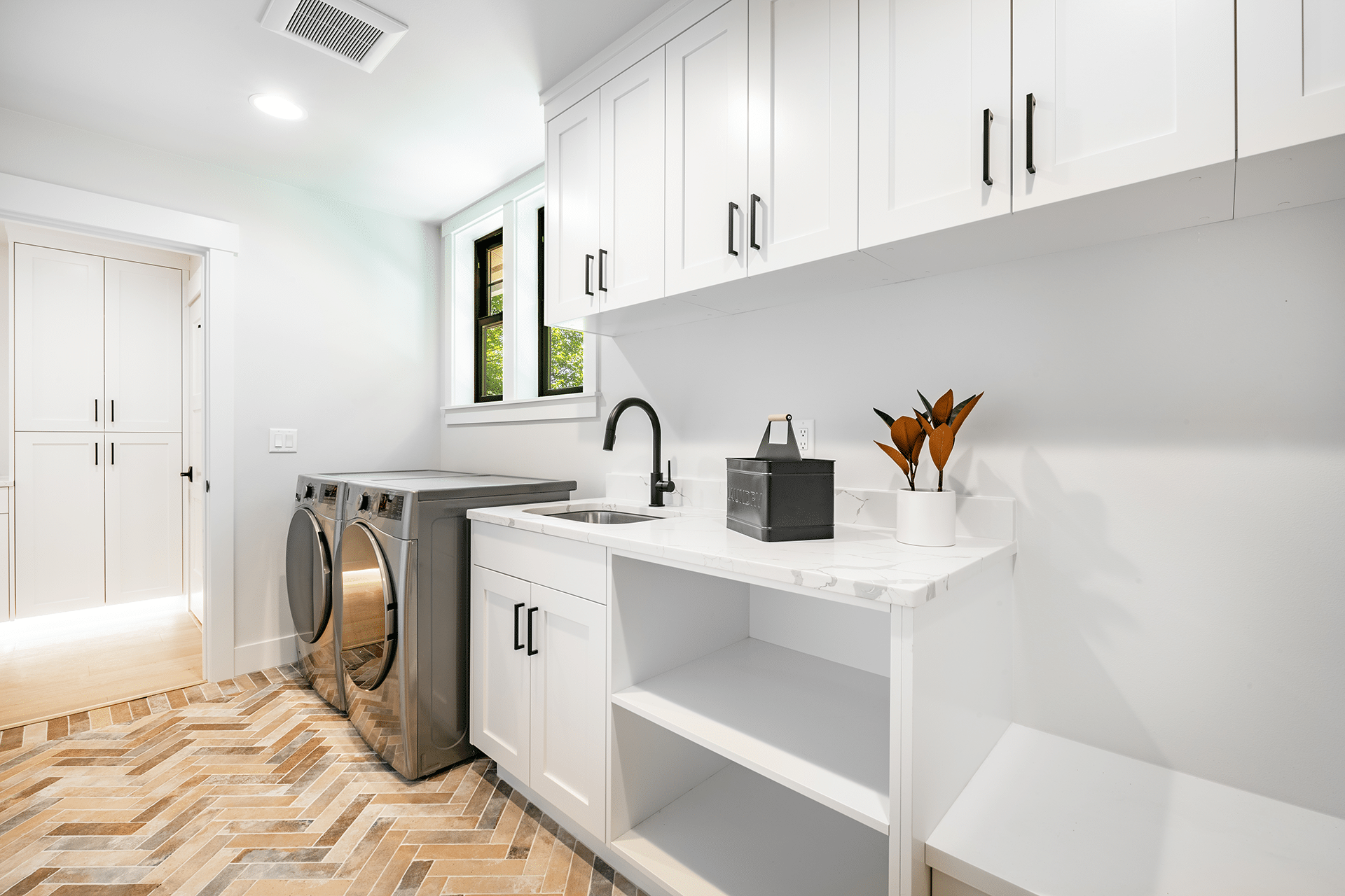 Laundries built by Quality Cabinets
